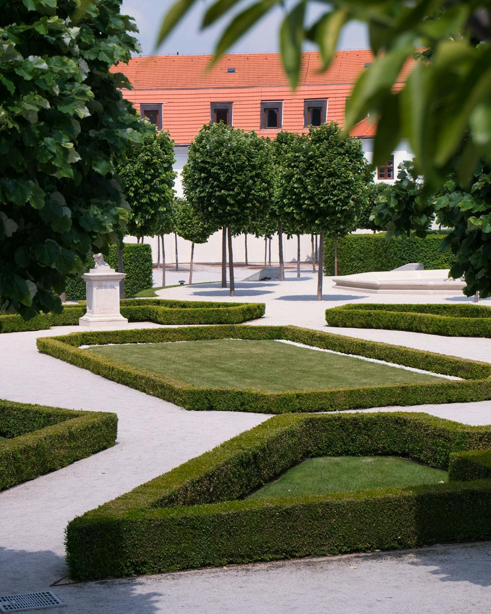 Formal garden with manicured hedges and lawn