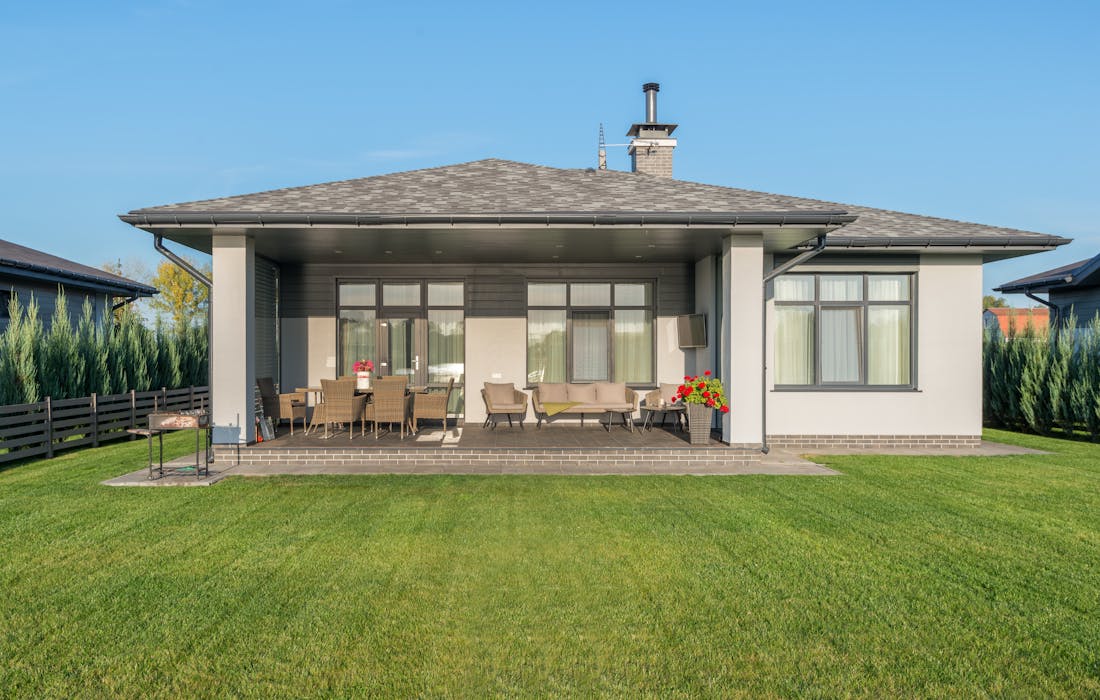Green backyard lawn and garden area